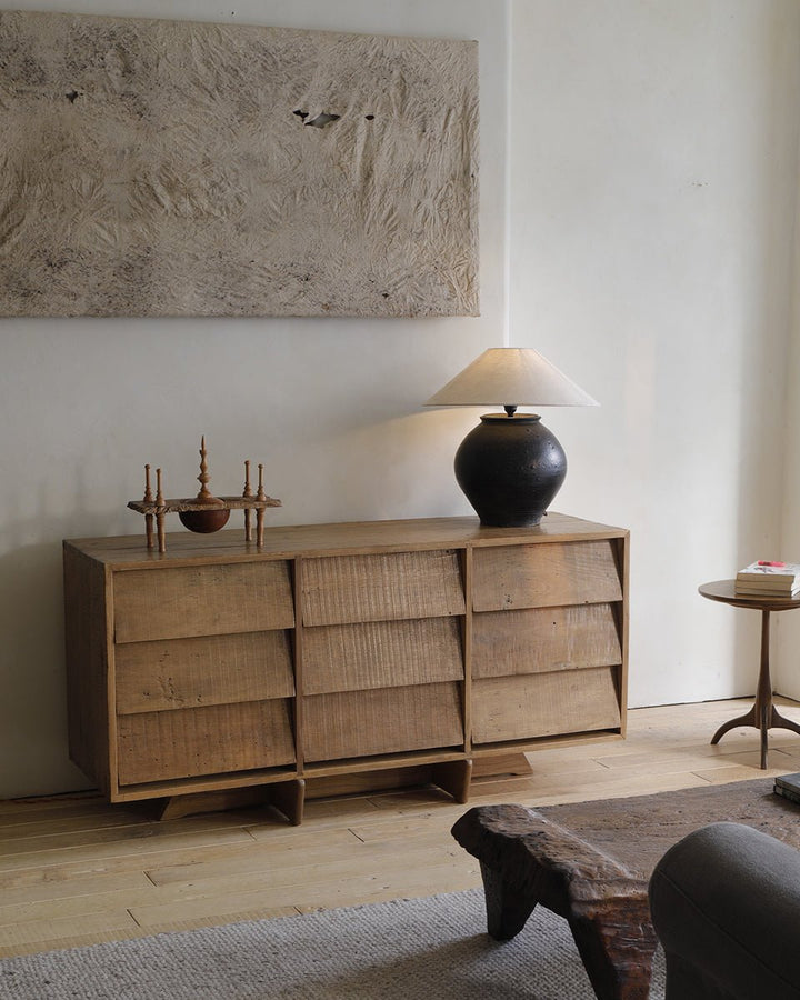NO.9 Sideboard with handleless design and lamp in a minimalist living space
