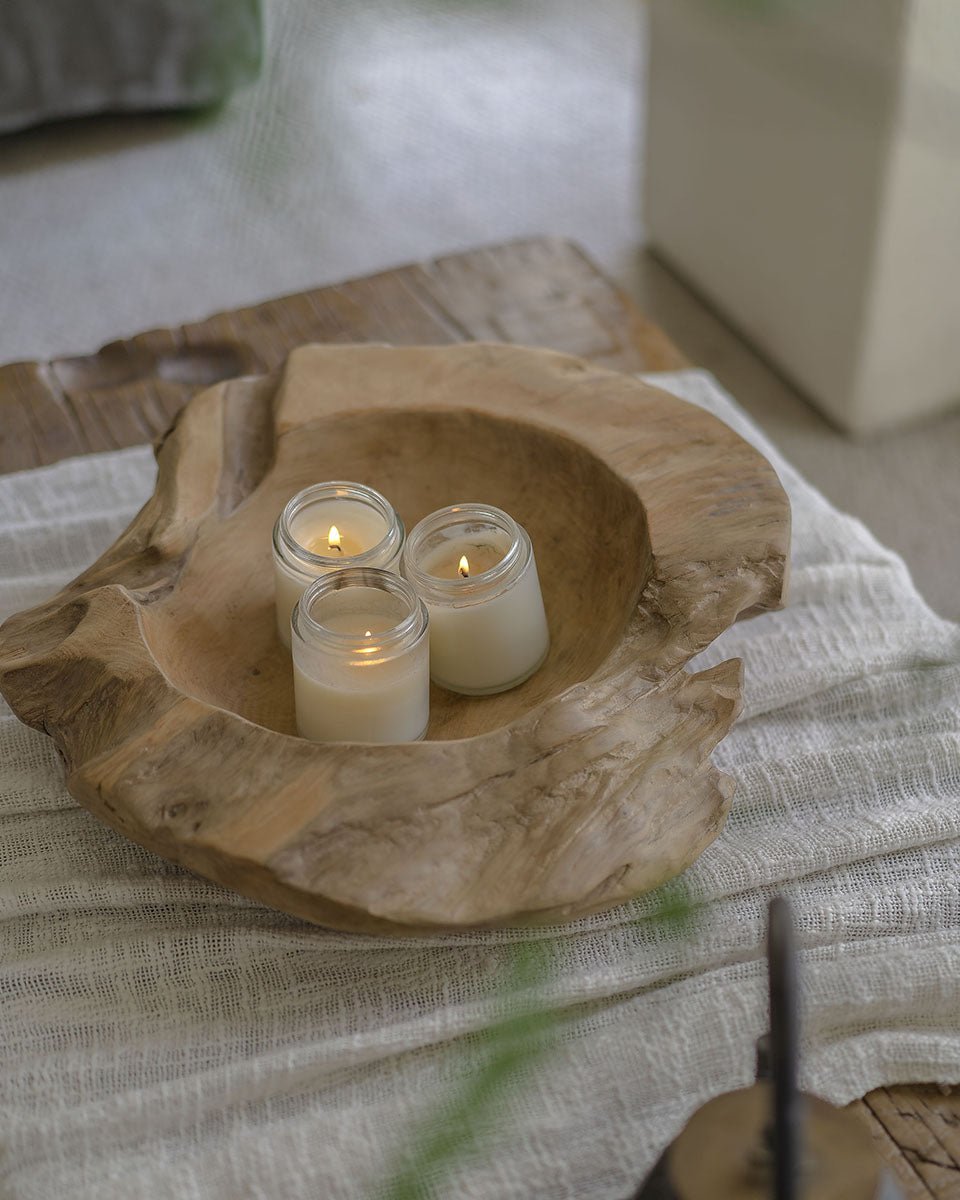 Wooden platter with three candles. Indonesian Teak handmade platter for decorative display.