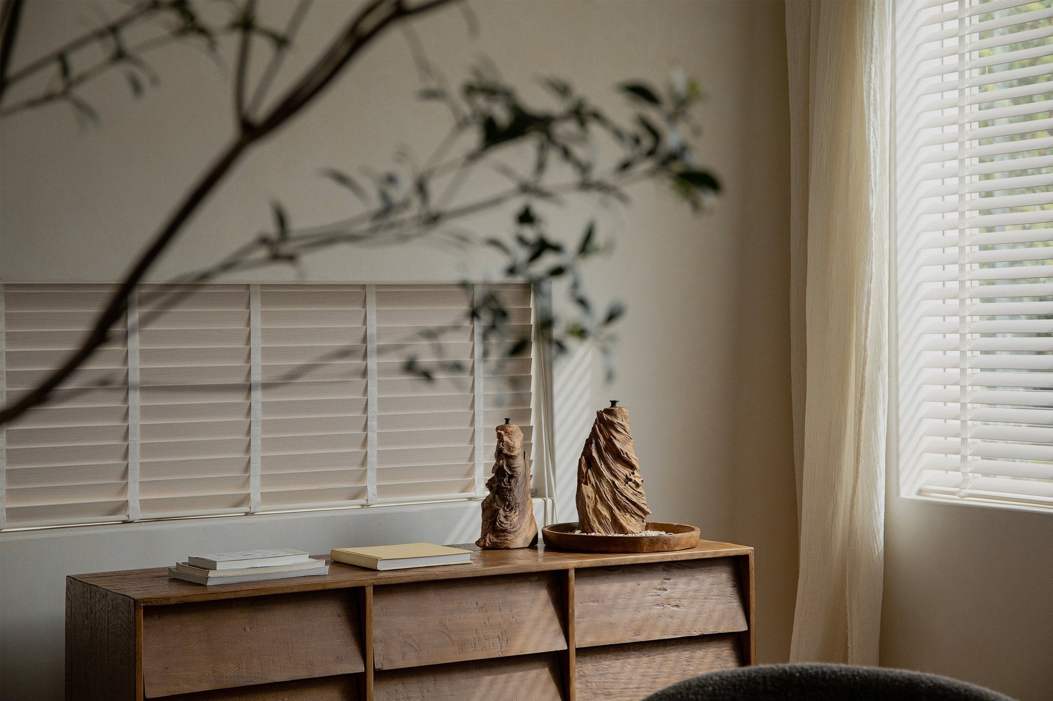 Wooden wavy vases displayed on a wooden cabinet, perfect for home decor
