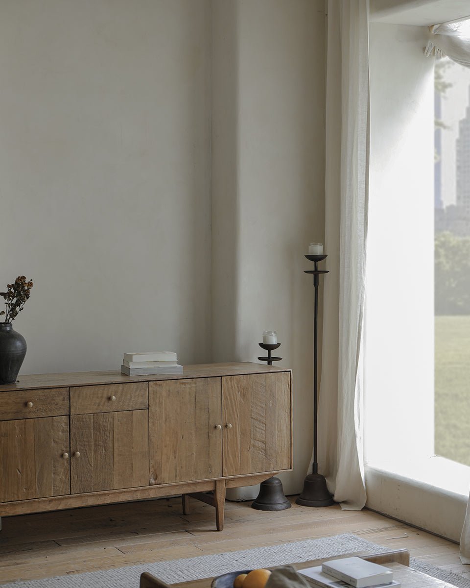 OX Sideboard in a living room setting with vintage aged wood, natural grain, and minimalist decor.