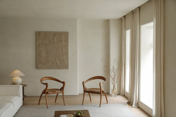 Olivia Chairs in a modern living space with soft natural light and minimalist decor.