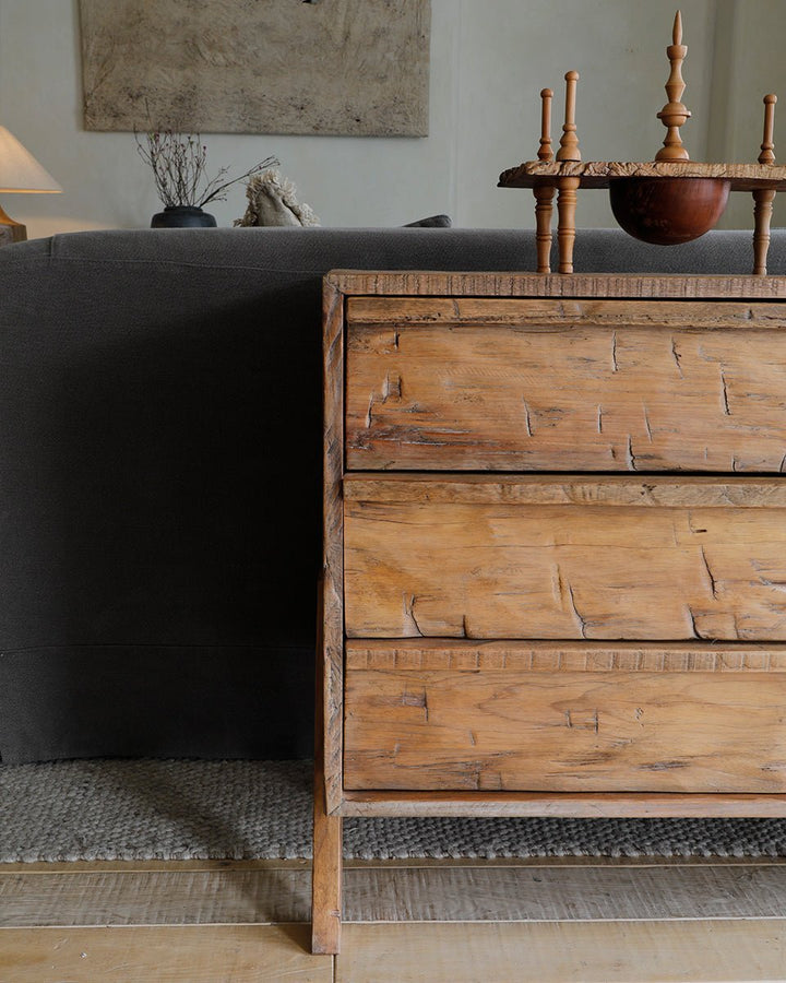 NO.32 Sideboard featuring textured reclaimed wood and decorative accents in a cozy setting