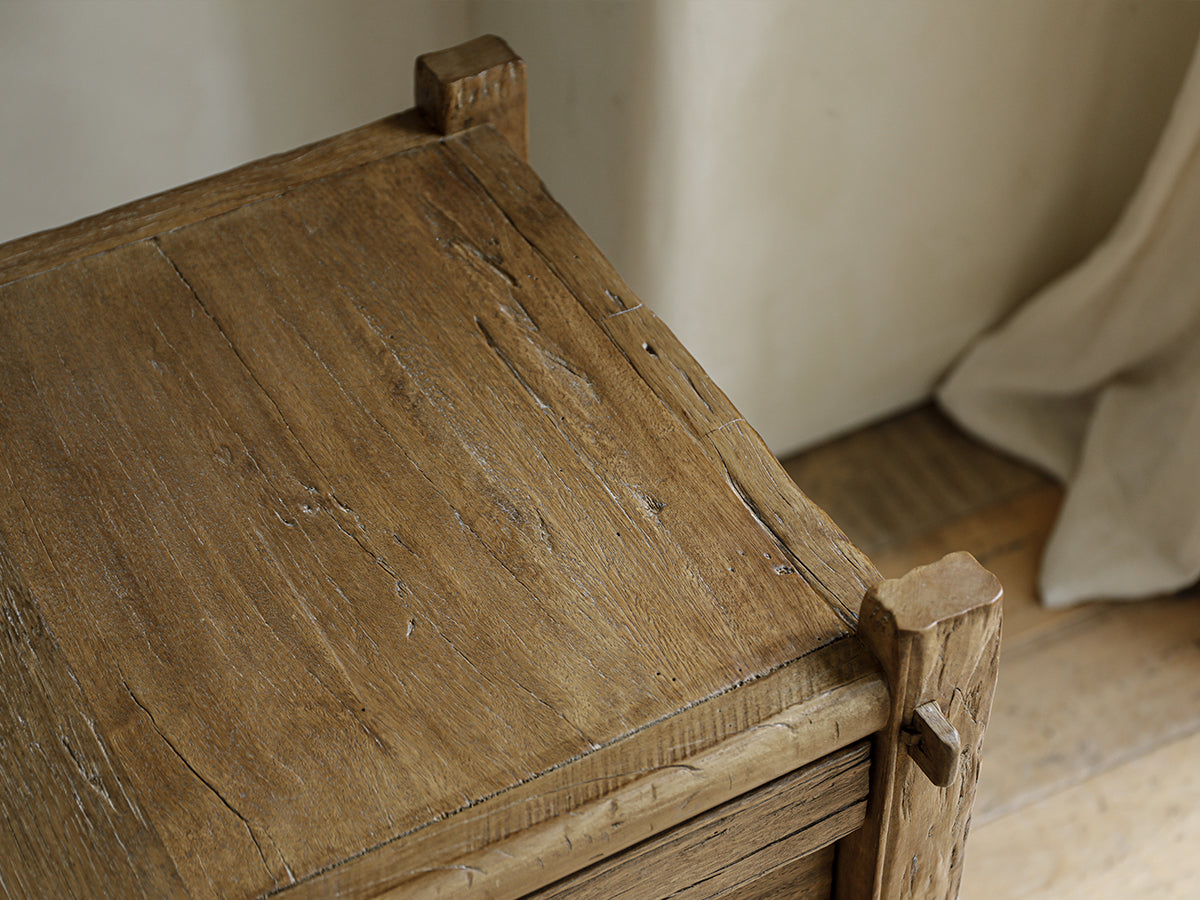 Treasure Nightstand close-up, showing solid wood construction, mortise and tenon joints, natural wood grain, vintage design