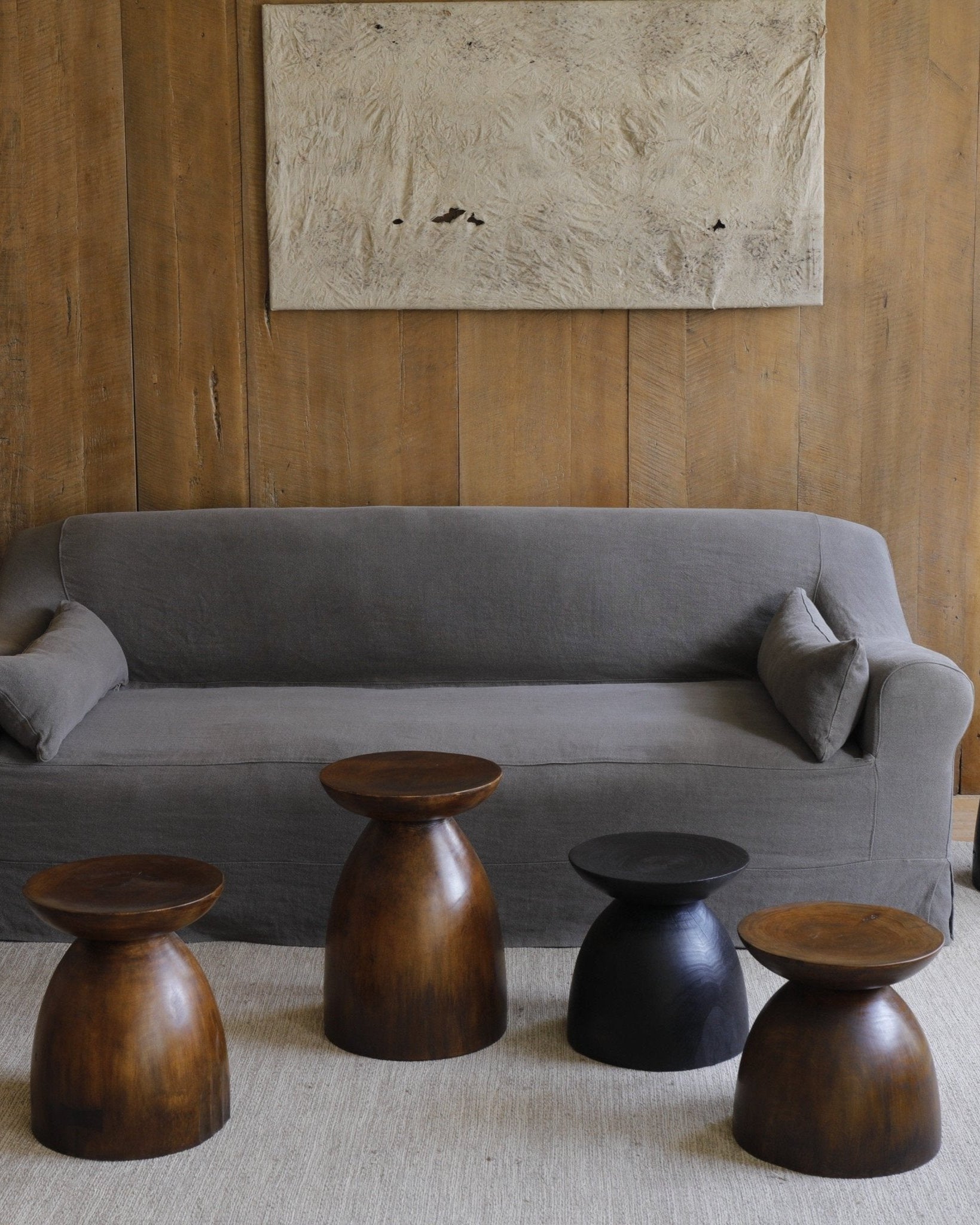 Sandglass tables in a living room setting, featuring Samanea saman wood with minimalist design